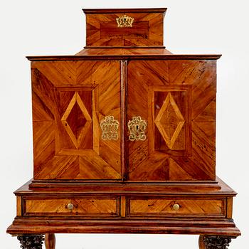 A first half of the 18th century walnut cabinet.