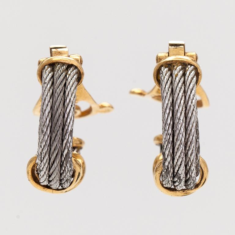 A pair of 'Force 10' earrings, 18K gold and steel. Fred, Paris 1980's.