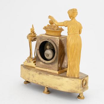 A French Empire gilt bronze mantle clock, early 20th Century.