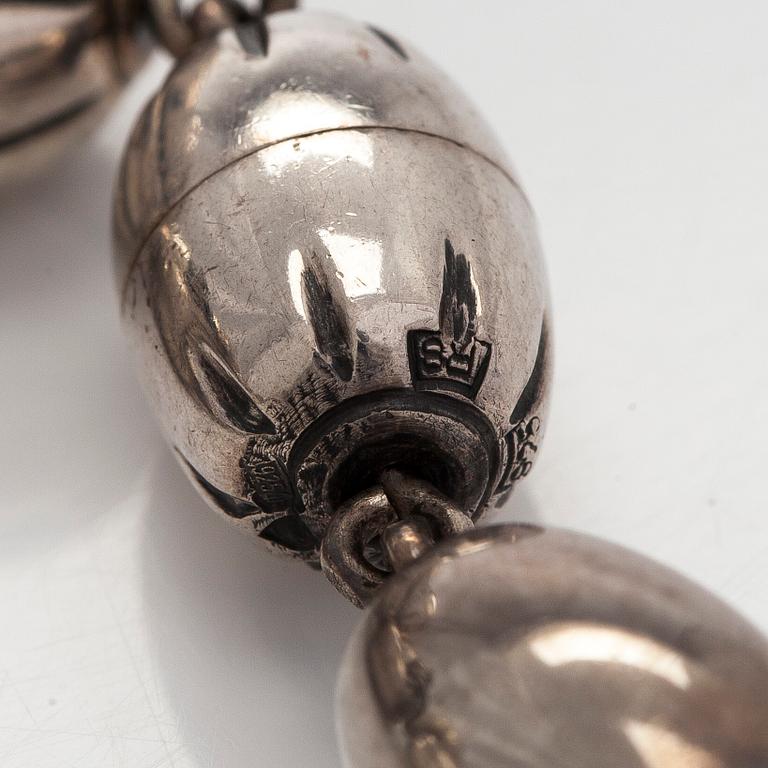 Kalevala Koru, a set of sterling silver "Halikko treasure" necklace, bracelet, ring and earrings. Helsinki 1994.