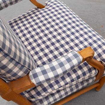 An end of the 20th Century pair of Gustavian style oak armchairs.