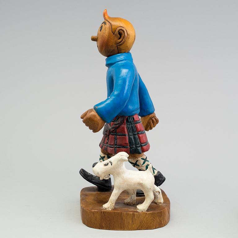 a Tintin and snowy wood scuplture from the second half of the 20th century.