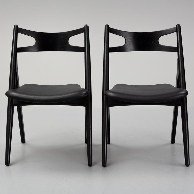 Hans J Wegner,  four 'CH29P Sawbuck' chairs, Carl Hansen, 2007.