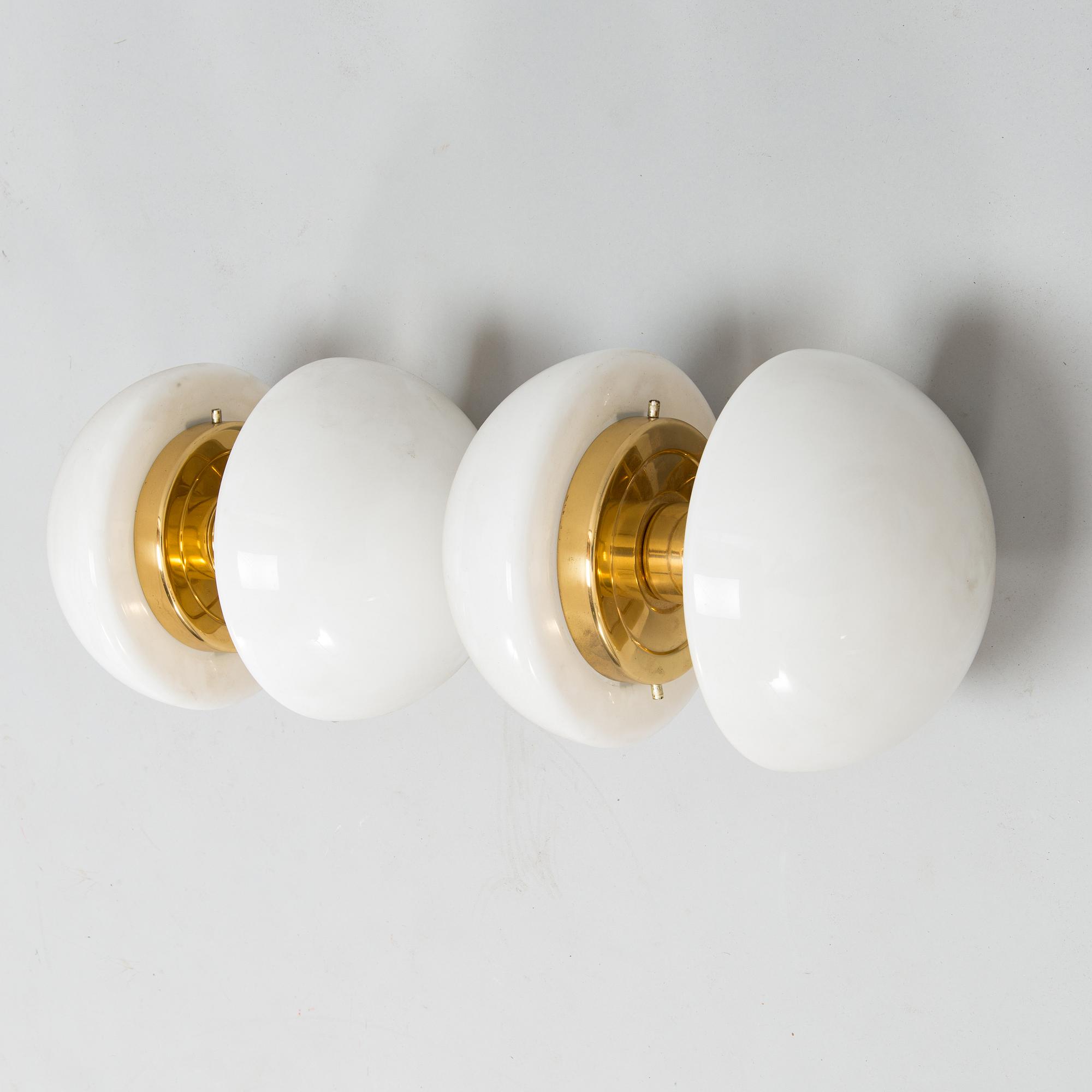 KLAUS MICHALIK, a pair of wall lamps, "Bau", Orno.