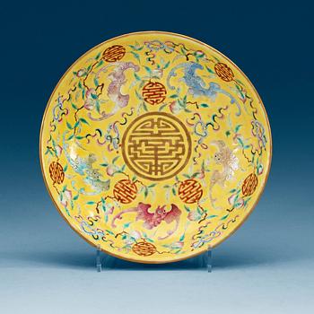 1829. A Chinese yellow glazed dish, presumably Republic with Guangxu six character mark.