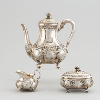 A rococo-style coffee pot, creamer and sugar bowl, swedish import mark, 20th century.