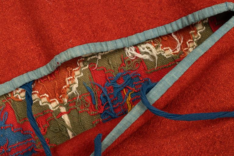 A carriage cushion, double-interlocked tapestry, ca 109,5 x 46 cm, Scania, Sweden.