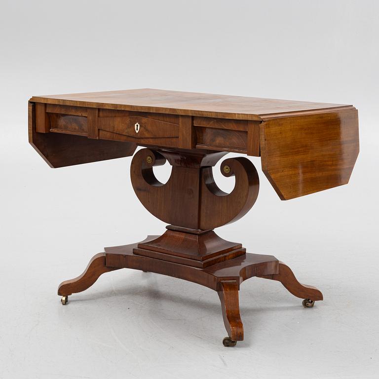 A Swedish Empire mahogany center table, early 19th century.