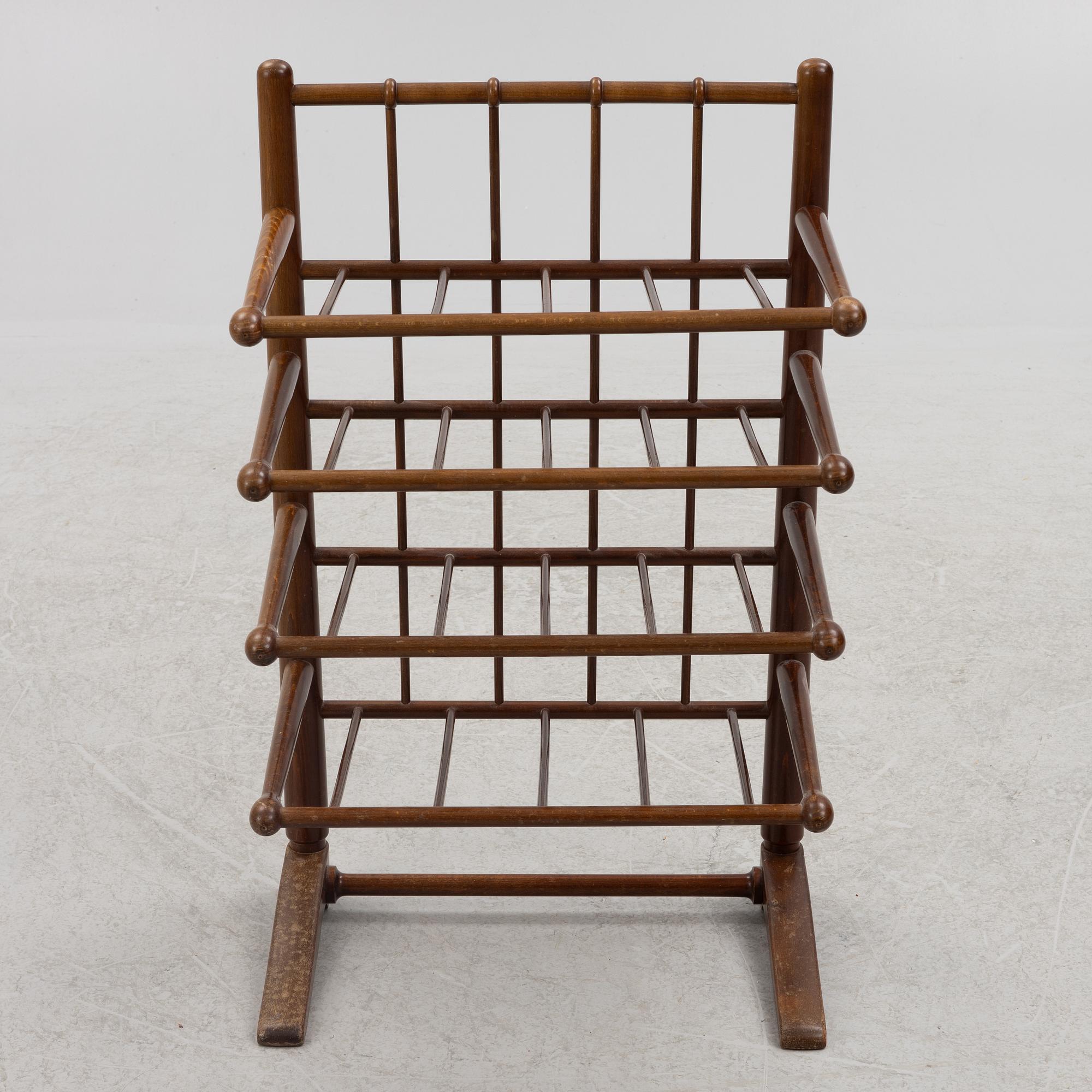 A magazine rack, mid-20th century.