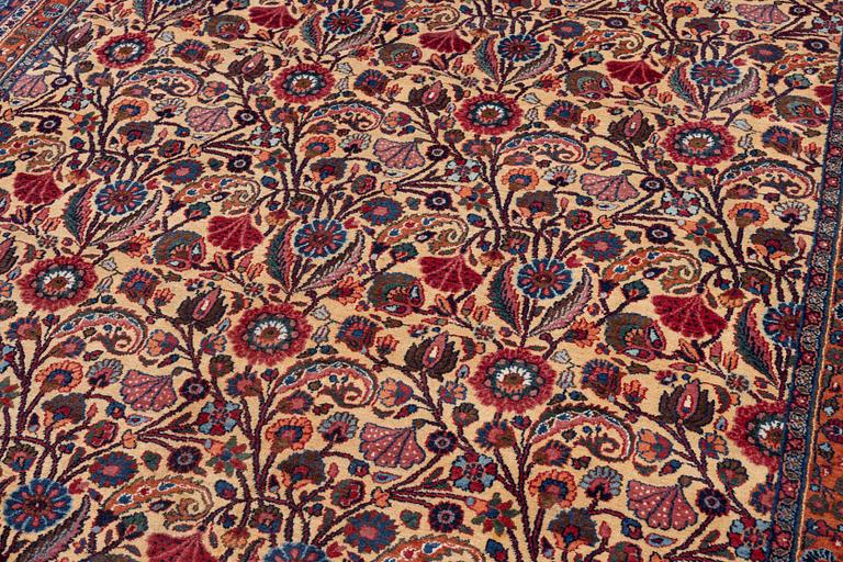 A semi-antique Birjand carpet, Eastern Iran, signed, c 390 x 296 cm.