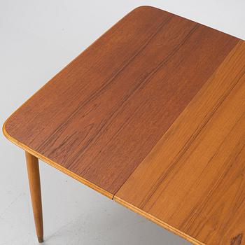 A dining table, teak, 1960s.