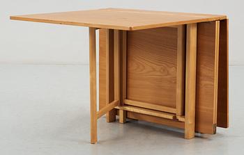 A Bruno Mathsson 'Maria' elm and birch gate-leg table.