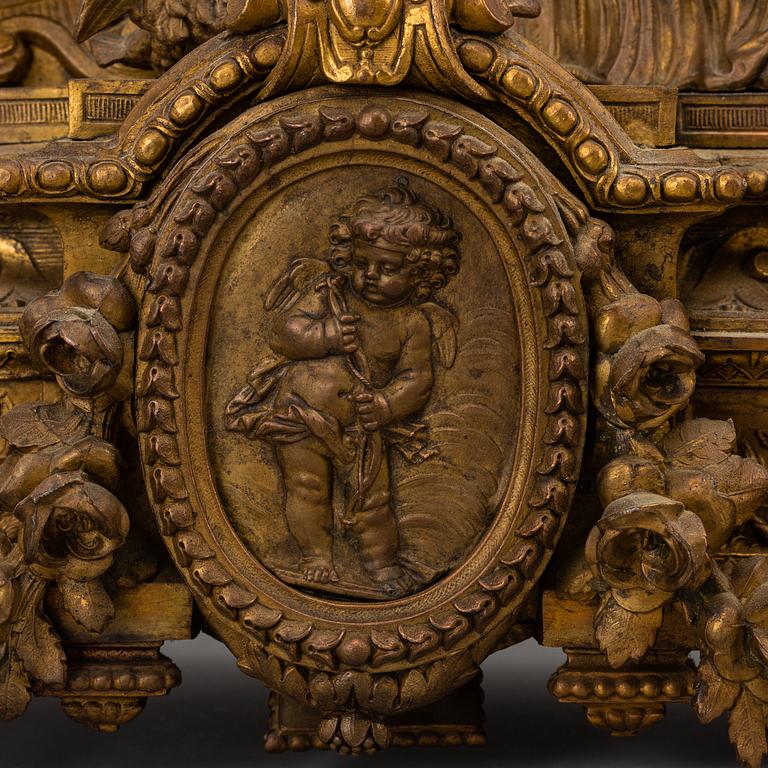 A  French 19th century mantle clock in Louis-XVI style.