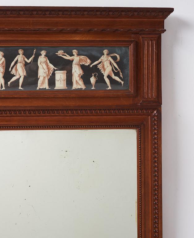 A carved and inset gouache late Gustavian mirror, late 18th century.