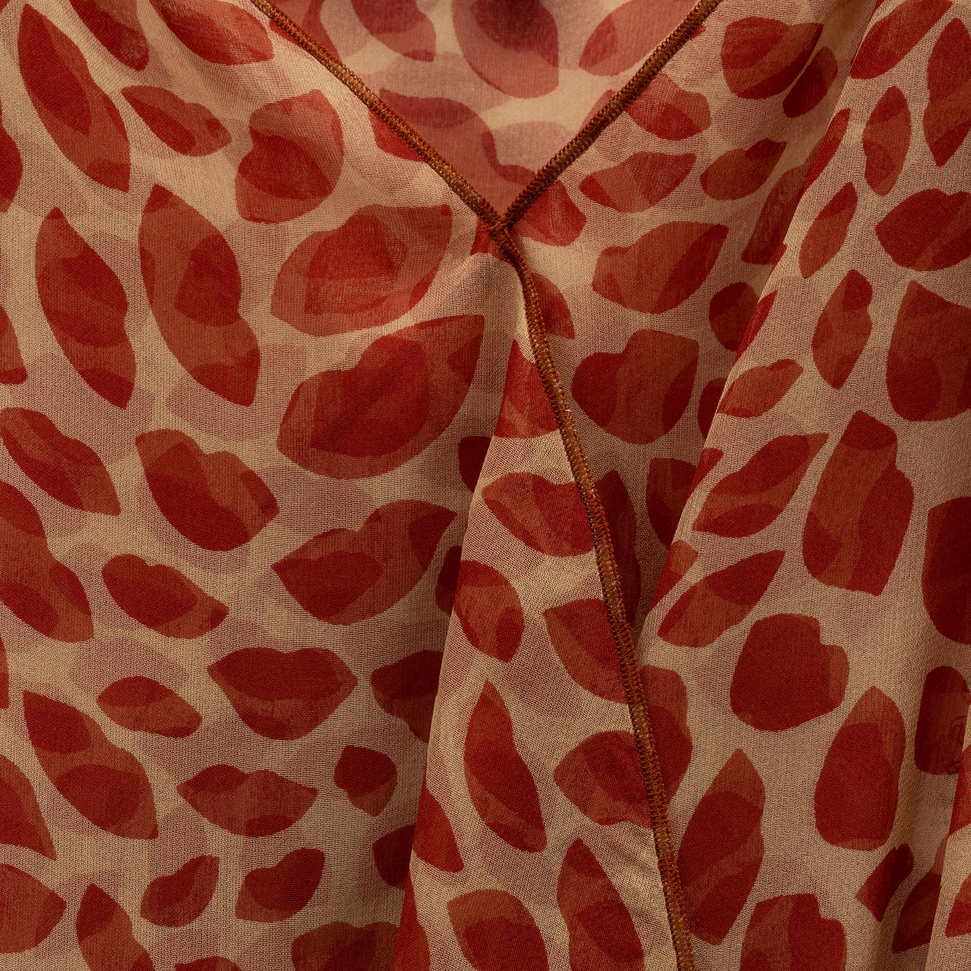 Yves Saint Laurent, a silk blouse, size 36.