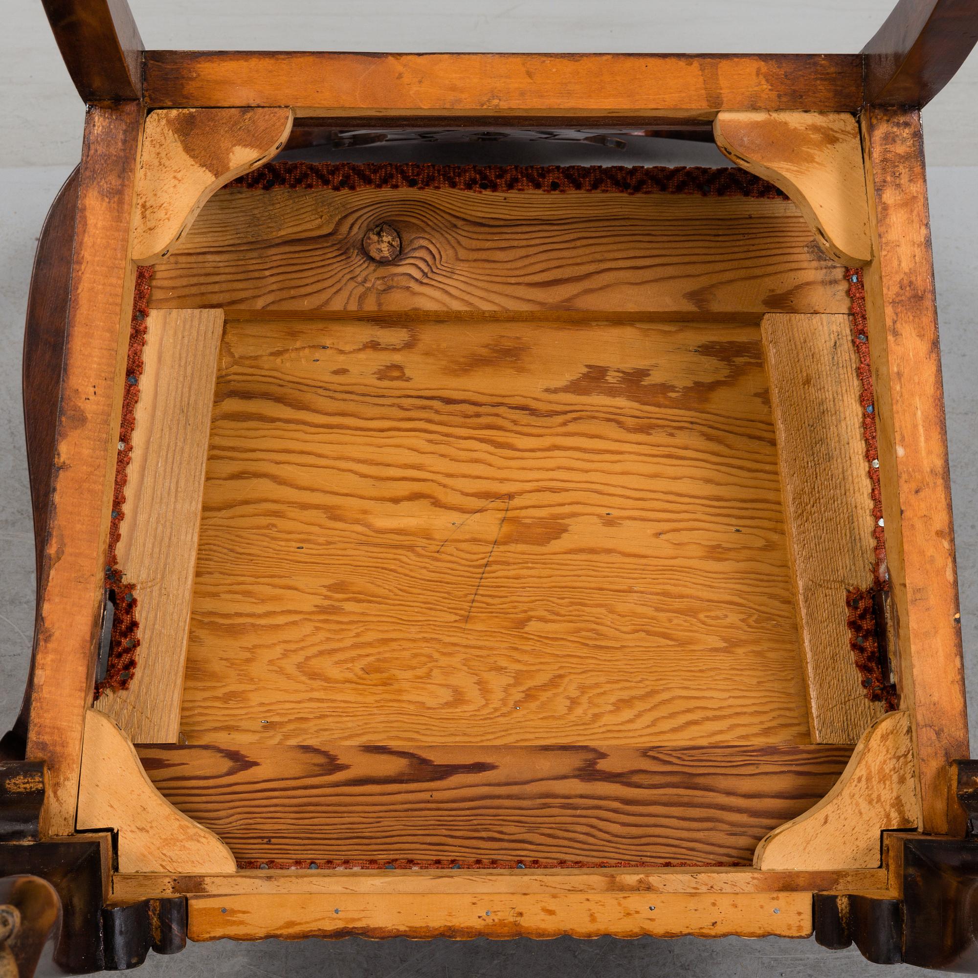 A 1920's 7 piece Chippendale-style dining group.