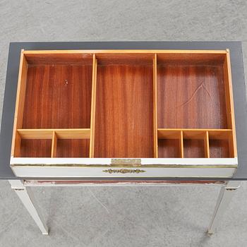 A Gustavian style table, first half of the 20th century.