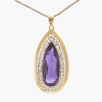 Necklace 18K and 14K gold with faceted synthetic purple sapphire.