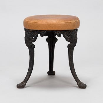 Cast iron stool, late 19th century.