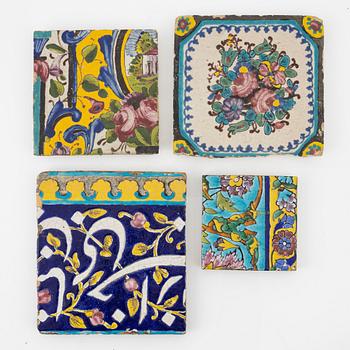 Kakelplattor, fyra stycken, glaserat lergods, Qajardynastin Persien (Iran), 1800-tal.