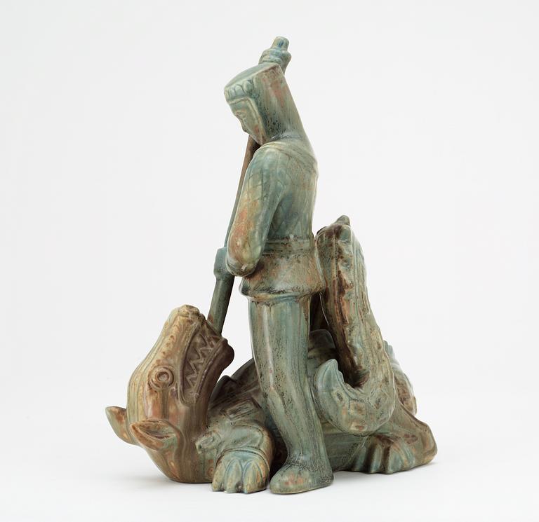 A Gunnar Nylund stoneware sculpture of S:t Michael and the dragon, Rörstrand.
