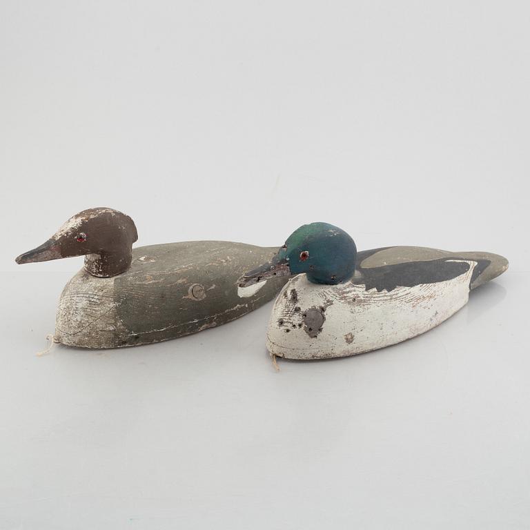 A pair of wood duck decoys, 20th century.