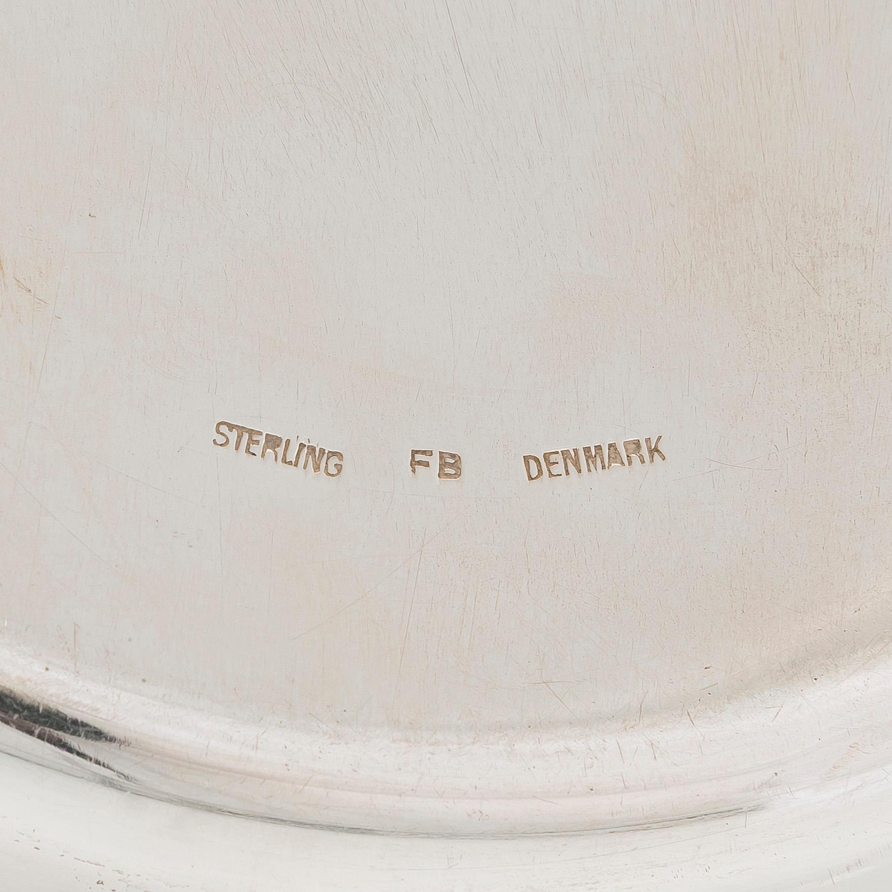 A pair of Danish sterling silver decanter coasters, maker's mark FB.