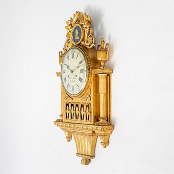 A Swedish gustavian wall clock by Jacob Kock, late 18th century.