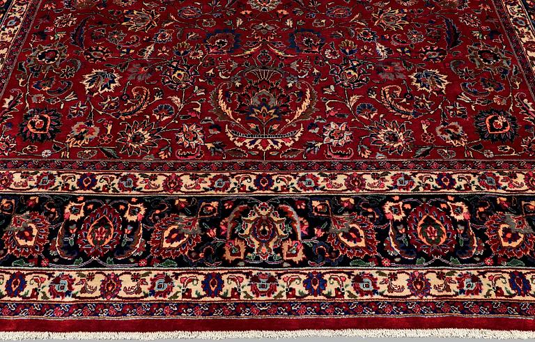 A CARPET, Mashad, signed, ca 405 x 300 cm.