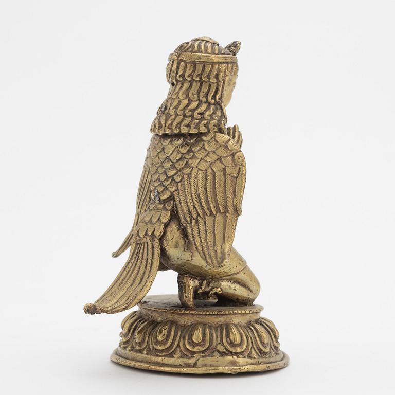 Figur i form av bevingad dignitär, Nepal, 1900-tal.