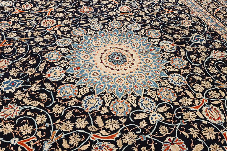 A Kashan carpet, c. 397 x 300 cm.