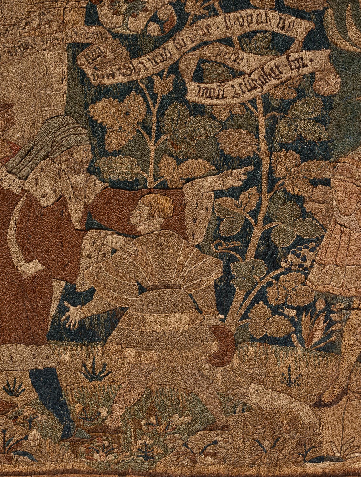 An embroidered framed fragment of a Swiss table carpet, first half of the 16th century.