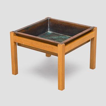 Carl Gustaf Hiort af Ornäs, A mid-20th century flower table for Puunveisto Oy - Träsnideri Ab, Finland.