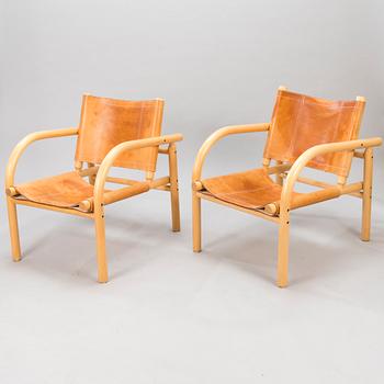 A pair of 1980s ' 411' armchairs for Artek, Finland.