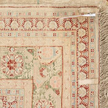 A RUG, an antique silk Tabriz, ca 165 x 118,5-111,5 cm.