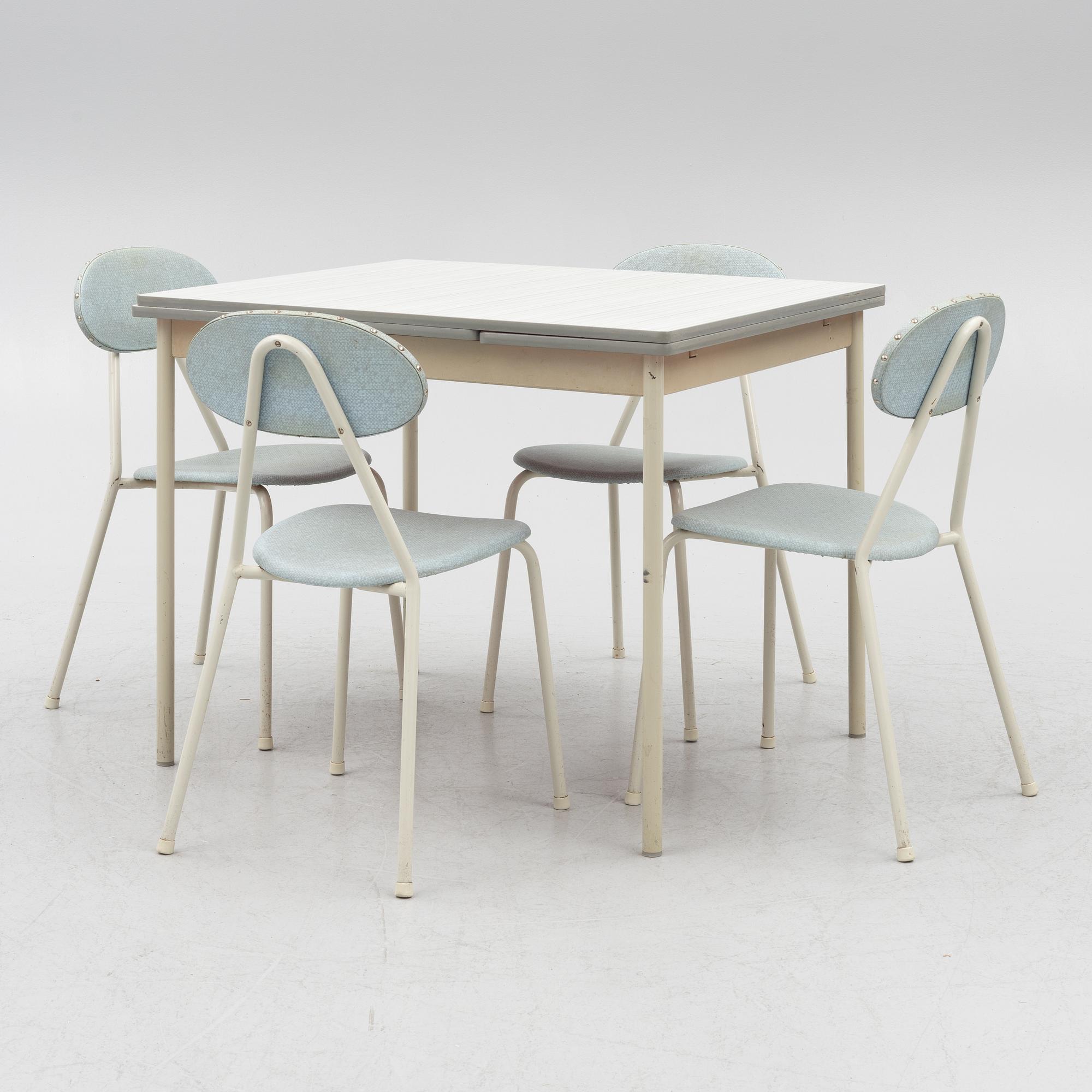 A table and four chairs, mid-20th Century.