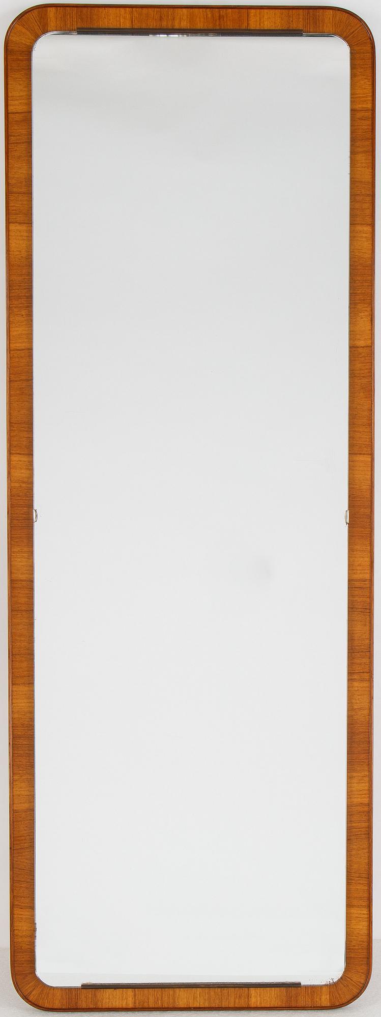 A teak mirror, mid 20th century.