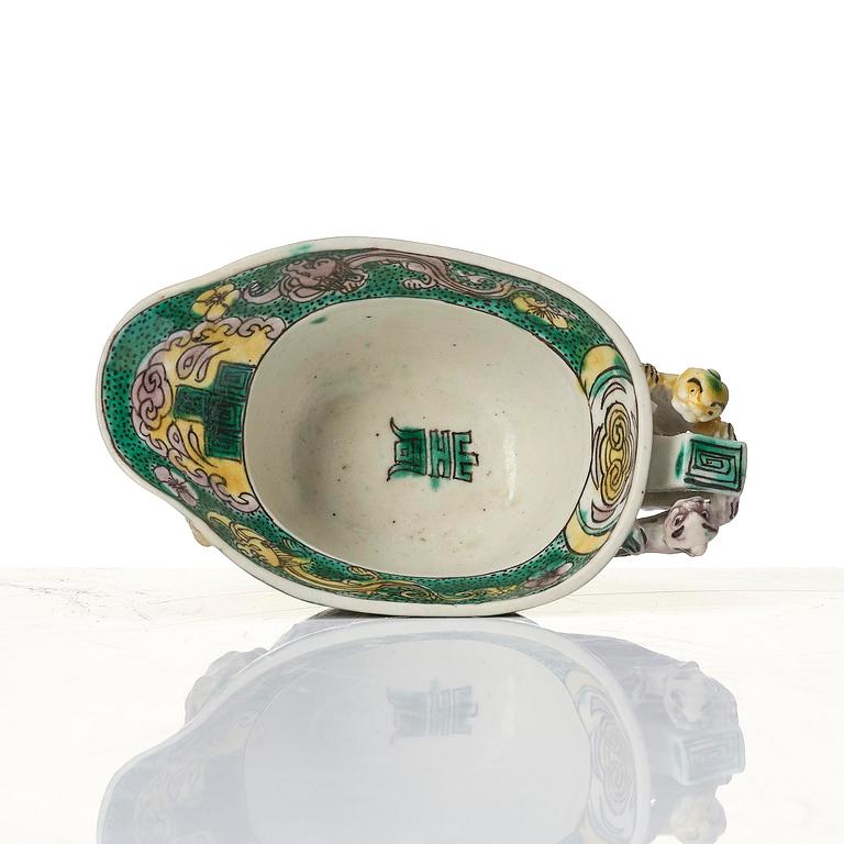 A famille verte bisquit libation cup, Qing dynasty, Kangxi (1662-1722).