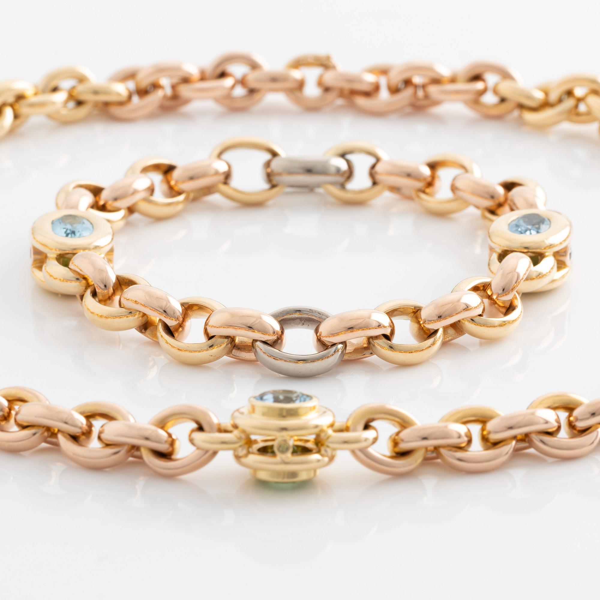 Gaudy, necklace and bracelet with peridot and aquamarines.