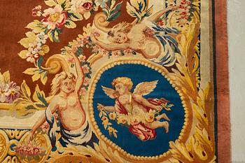 A carpet in savonnerie technique, ca 560 x 429 cm, Louis XVI style.