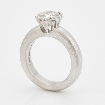 A SOLITAIRE RING.