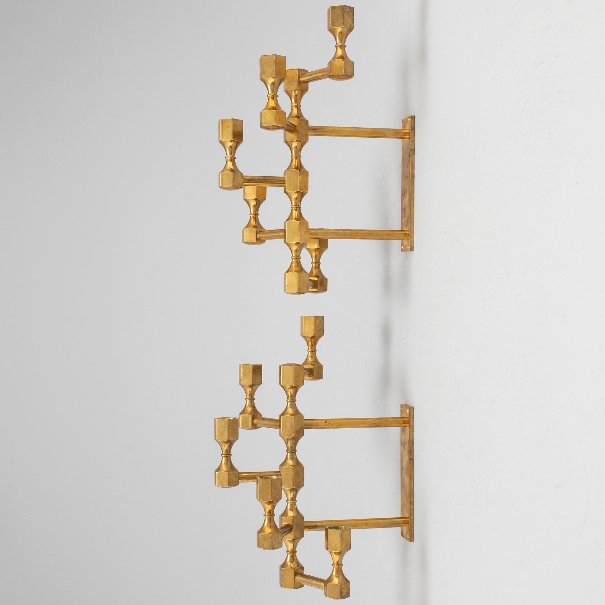 A pair of brass wall candelabras, for Gusum, signed BK and dated 1995 and 1997.
