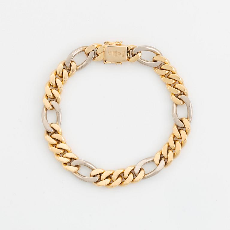 An 18K gold and white gold bracelet by Jan Hellströmer.