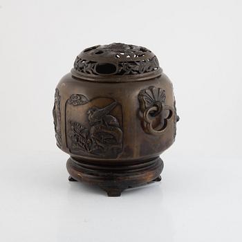 A bronze urn with stand, Japan, presumably Meiji (1868-1912).