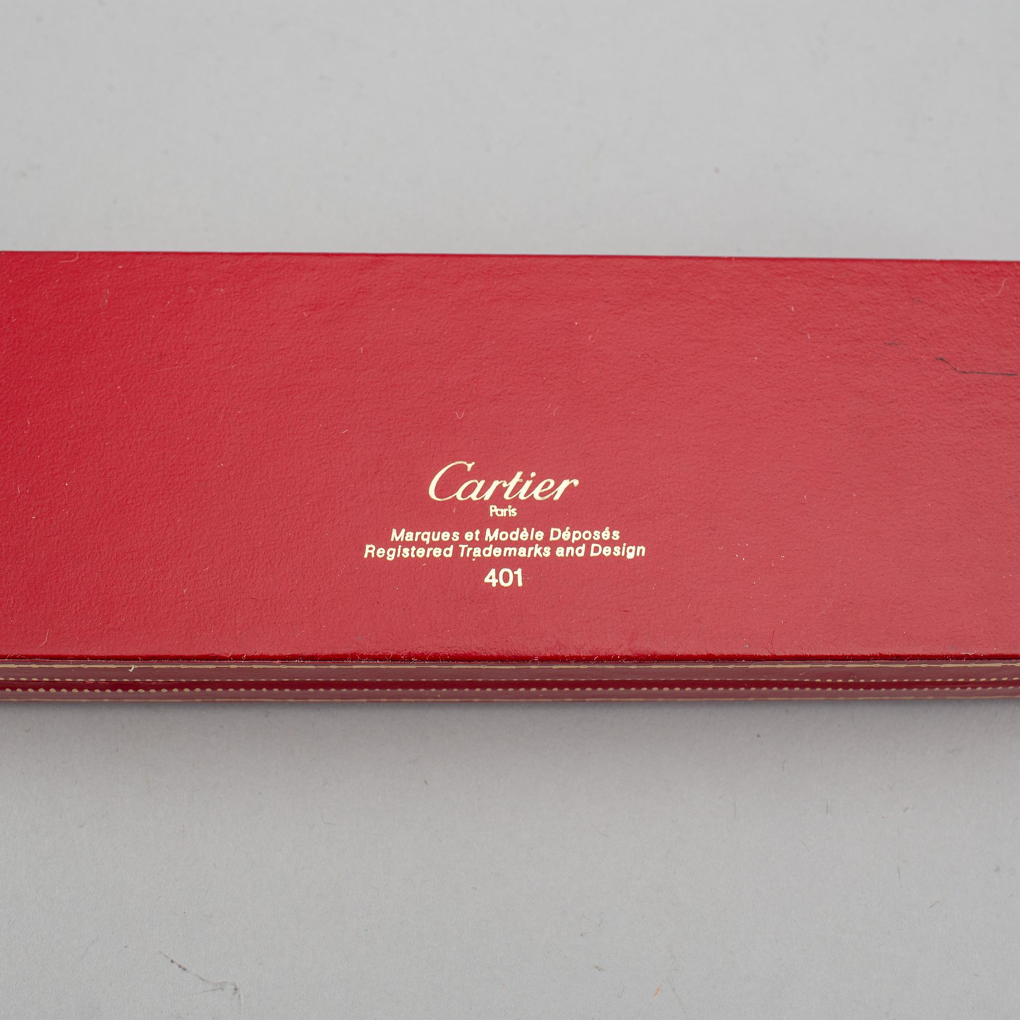 A Cartier lighter and pen.