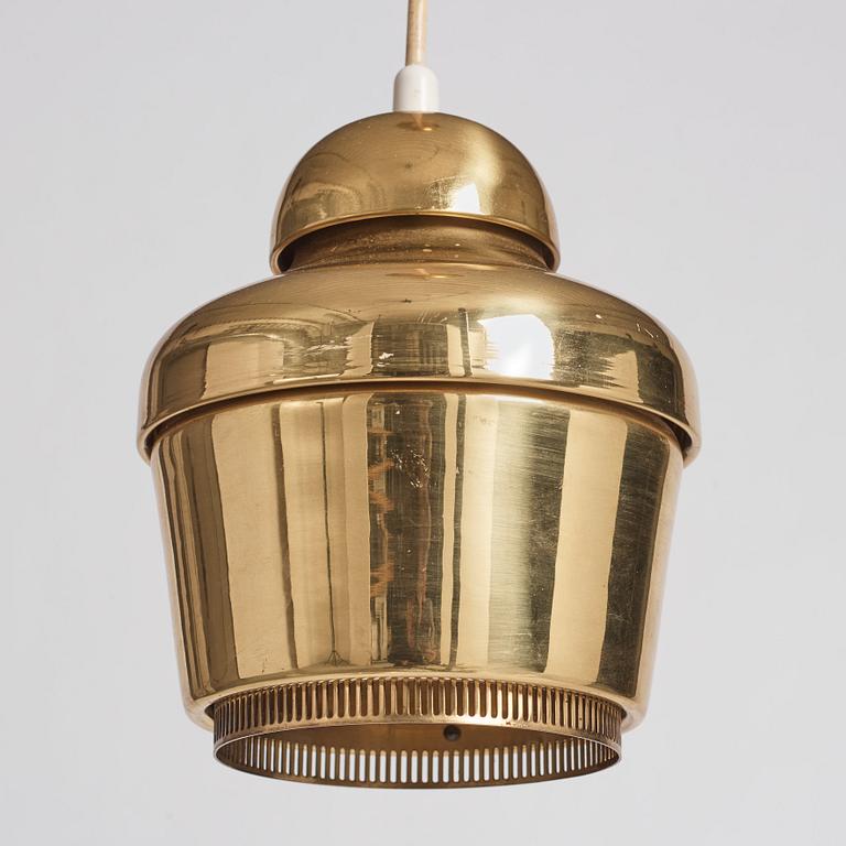 Alvar Aalto, a pair of "Golden Bell" brass pendant lamps, Valaistustyö, Finland, model "A330".