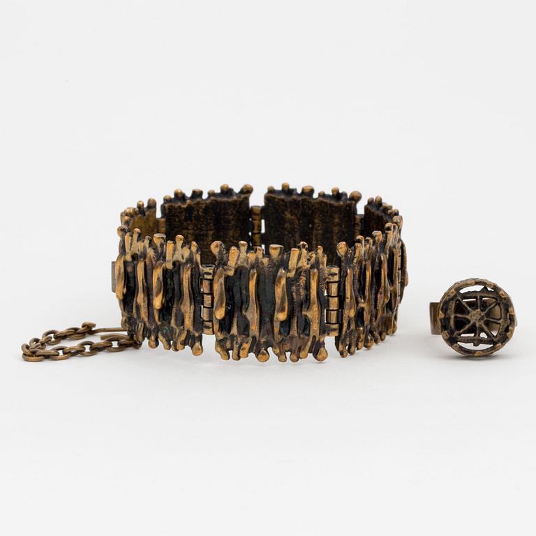 A bronze bracelet, ring and a pair of earrings by Pentti Sarpaneva, Finland.