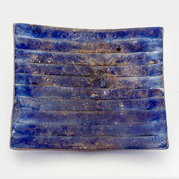 A Paula Barton signed and dated glass plate.