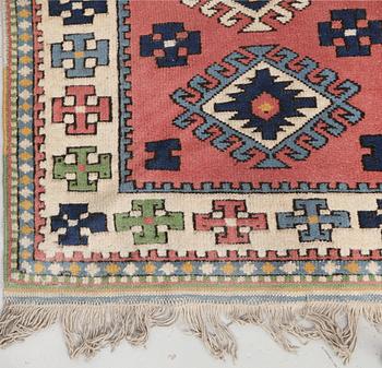 A semi-antique Kars runner, approx. 431 x 95 cm.
