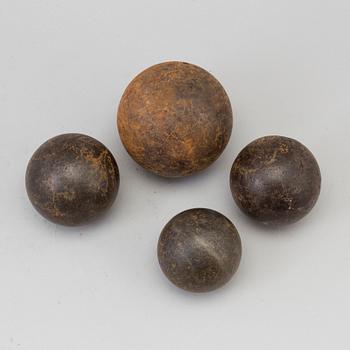 FOUR CAST IRON BULLETS, 18th/19th century.